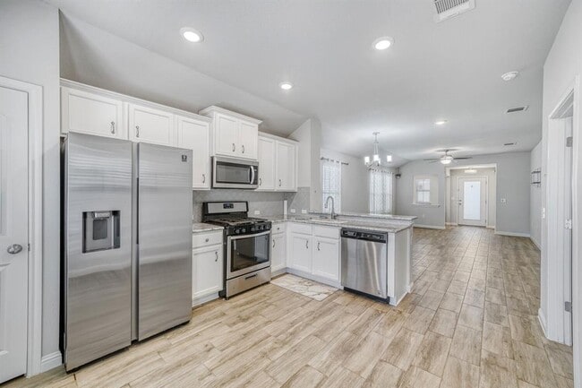 Building Photo - 8303 Cottage Rose Dr