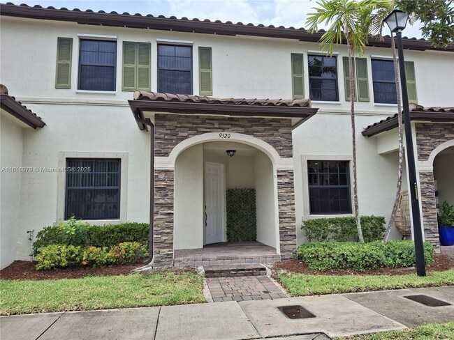 Photo - 9320 W 33rd Ln Townhome