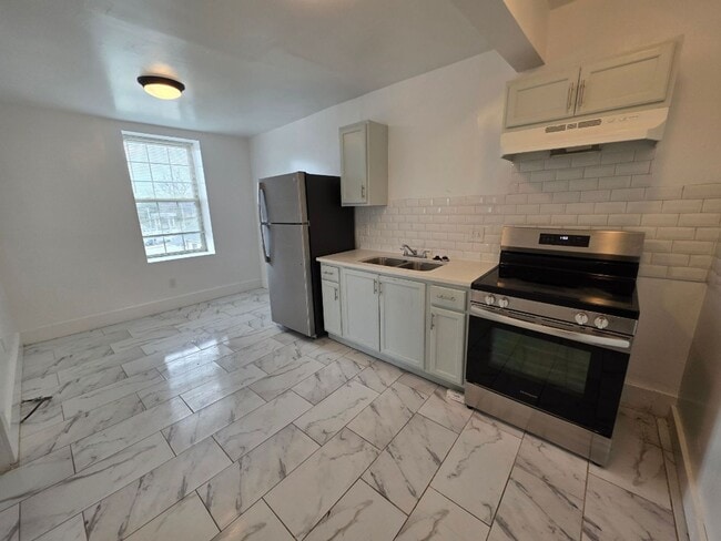 Photo - Modern 2-Bedroom Upper-Level Gem