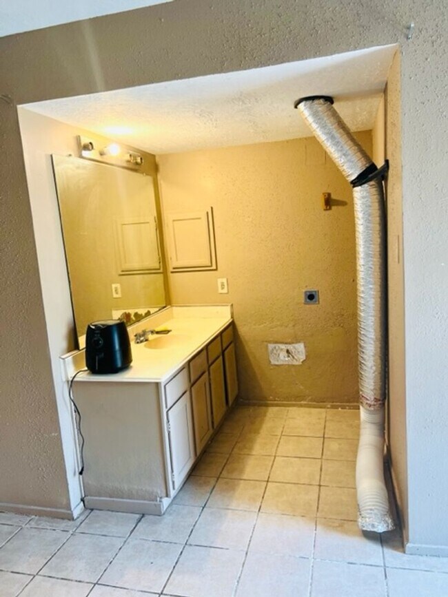 Photo - EFFICIENCY UNIT WITH TILE FLOORING THROUGHOUT