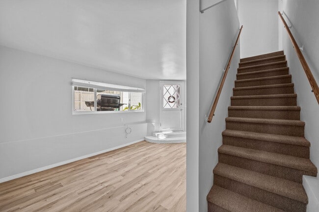 living room and staircase - 3525 N Poinsettia Ave Unit Manhattan Beach Gem