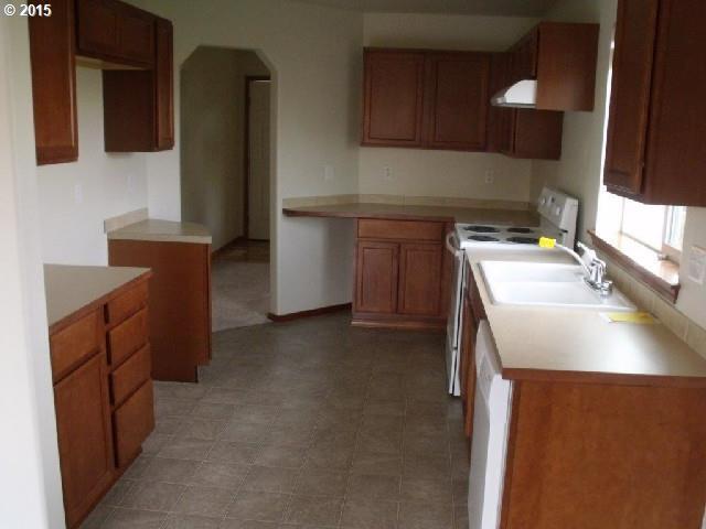 Photo - Spacious 4 Bedroom Home w/ Fully Fenced Yard & 2 Car Garage!
