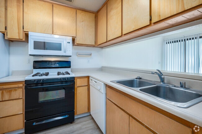 2BR, 1.5BA - 950SF - Kitchen - Le Tournesol