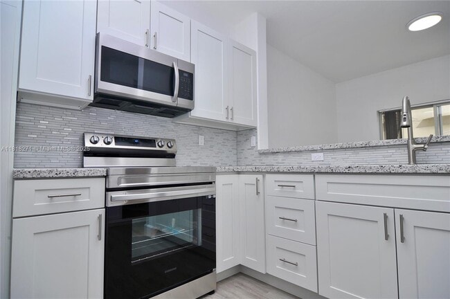 Building Photo - 1658 SE 28th Ct Unit 104 Rental