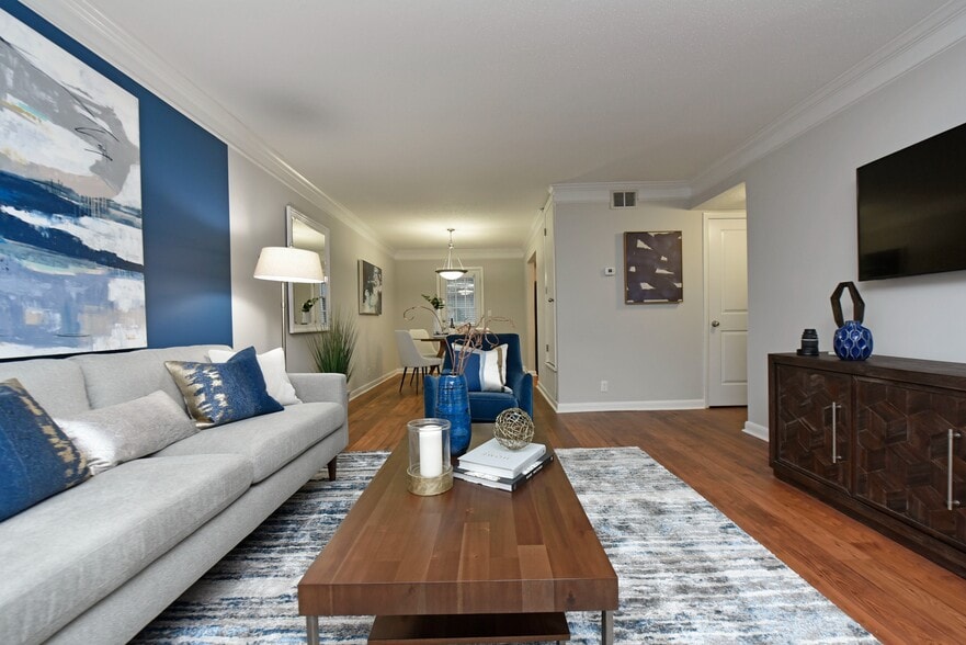 Spacious living room with hardwood-style flooring
