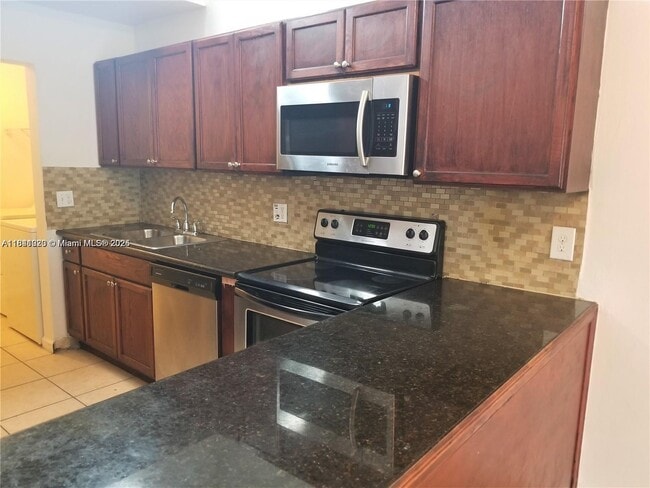Building Photo - 6979 SW 40th St Rental