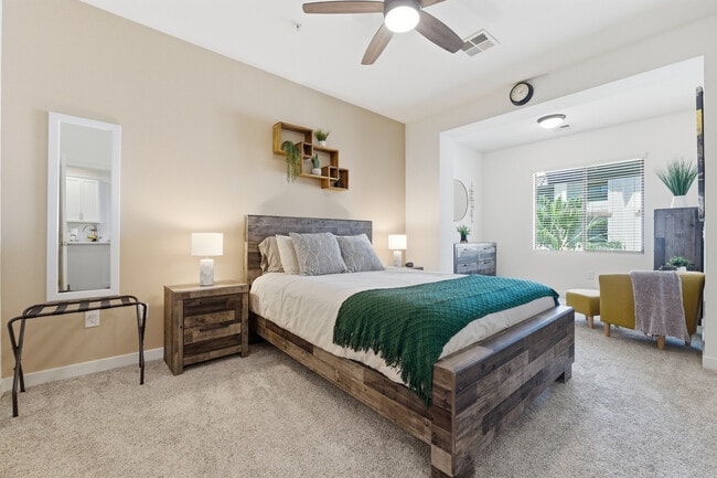 Spacious primary suite with plush bedding and thoughtful touches.