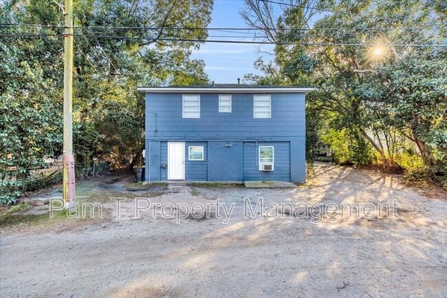 Building Photo - 1408 1/2 E 38th Upper