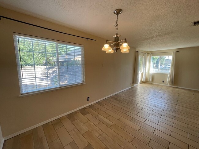 Photo - Charming 3-Bedroom Home with Fresh Interio...