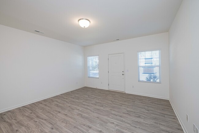 Photo - Cover front porch, two bedroom 2 1/2 bath townhome