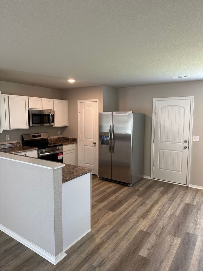 Available Now! Charming Three Bedroom | Two Bath in Cabot with Fenced Backyard