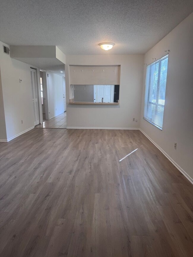 Photo - HOLIDAY SPECIAL! Updated 2/2 River Oaks Condo