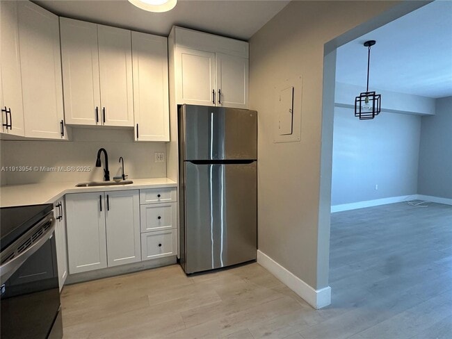 Building Photo - 5731 NW 37th St Unit 500-F