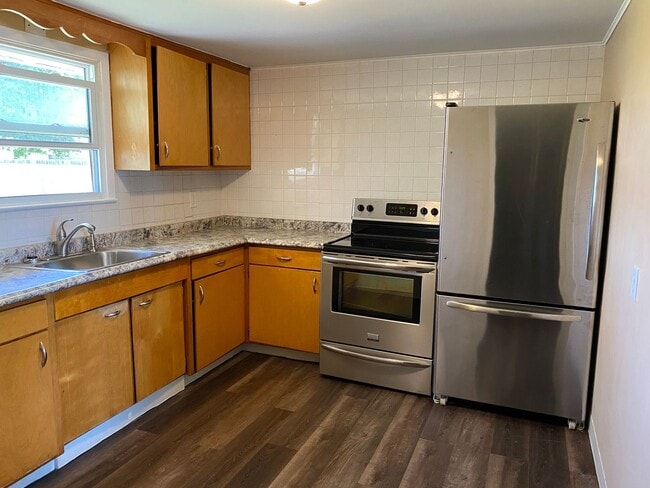 Photo - Cozy Silvis Home With Huge Fenced Yard and Attached Garage!
