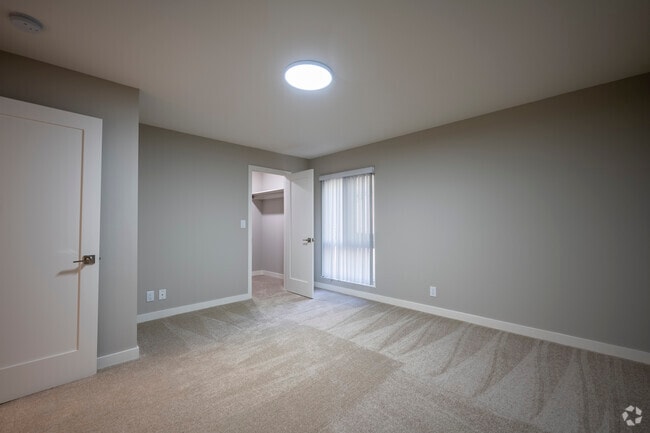 2BA, 1BA, 876SF - Primary Bedroom - Crown Towers Apartments