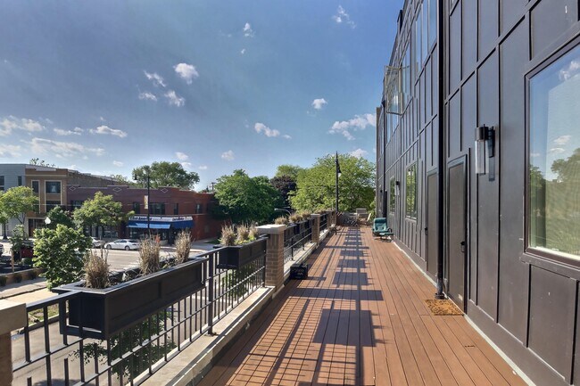 Deck off front of unit - 6351 N Magnolia Ave Apartments Unit D