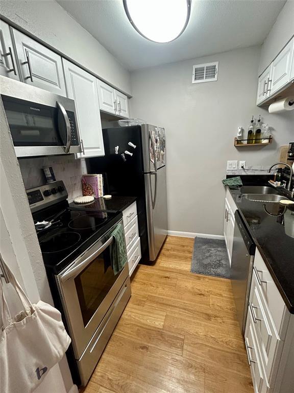 Photo - 2207 Leon St Unit 209