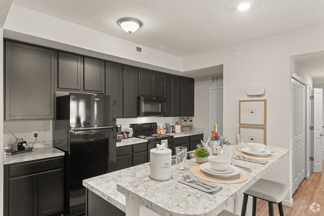 Building Photo - Residences at Golf Village Rental