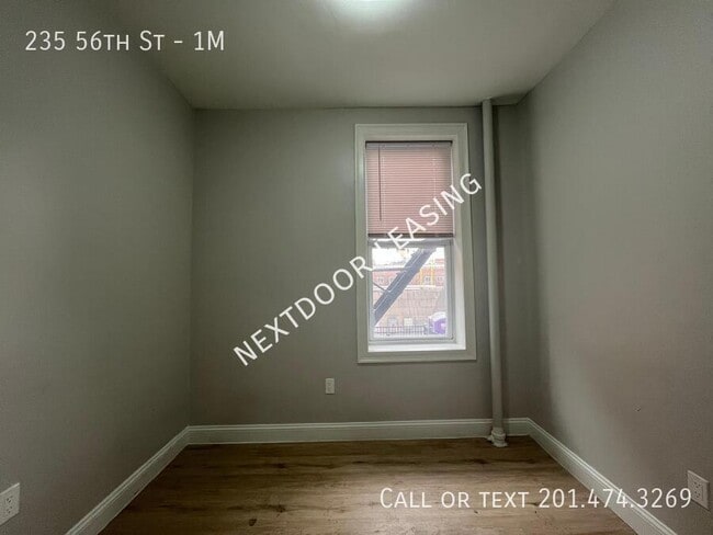 Photo - 235 56th St Unidad 1M