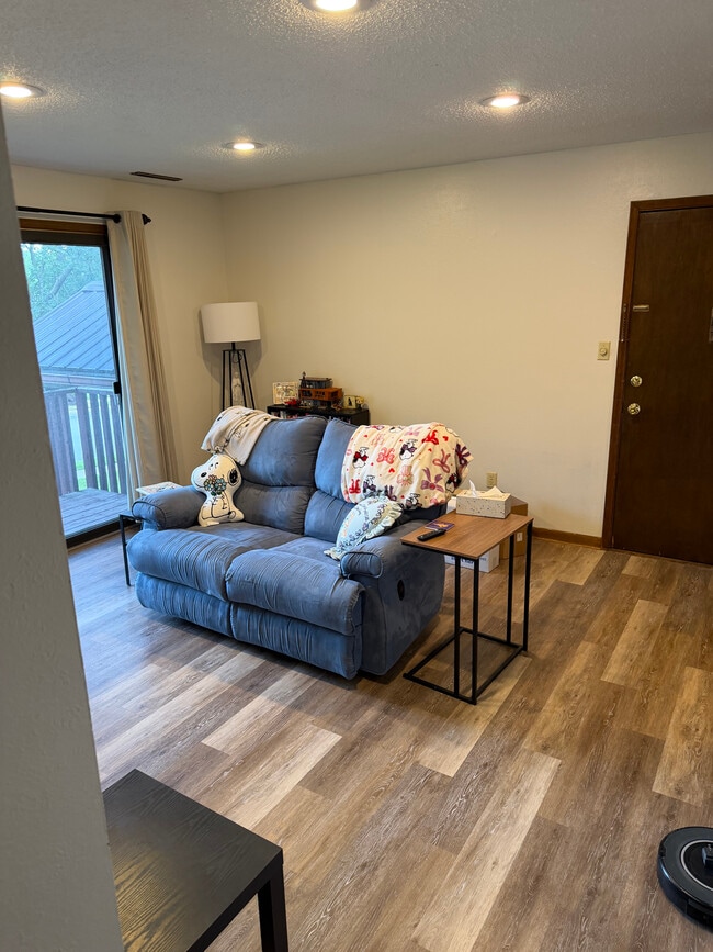 Living room with patio door to deck