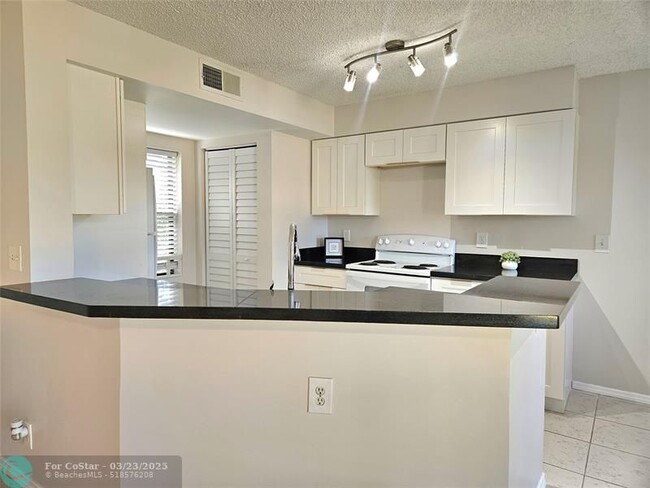 Photo - 9999 Summerbreeze Dr Condo Unit 1014