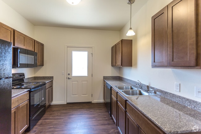Kitchen - Grand Slam Patio Home Apartments
