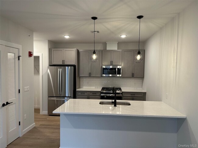 Building Photo - 13 Forester Ave Unit 203