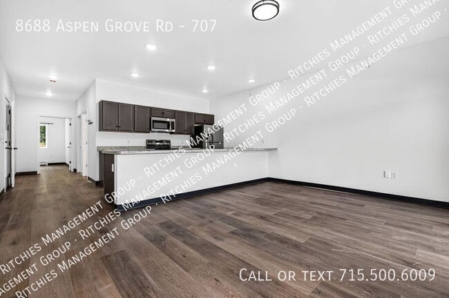 Building Photo - 8688 Aspen Ln Unit 707