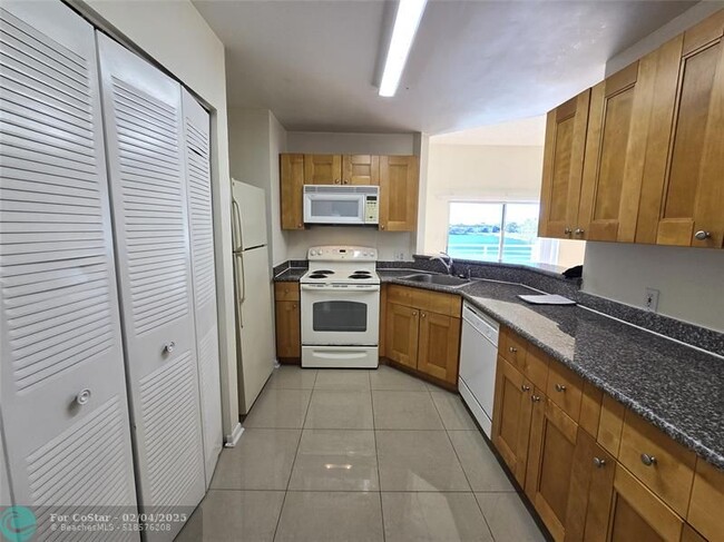 Photo - 3445 NW 44th St Condo Unit 201