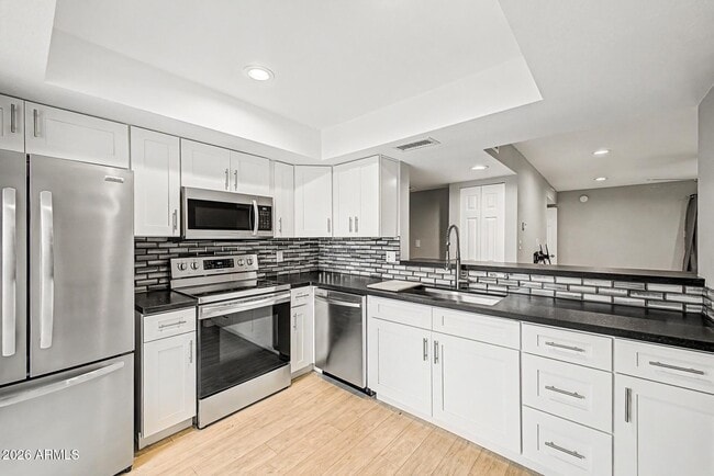 Photo - 9465 N 92nd St Unit 105