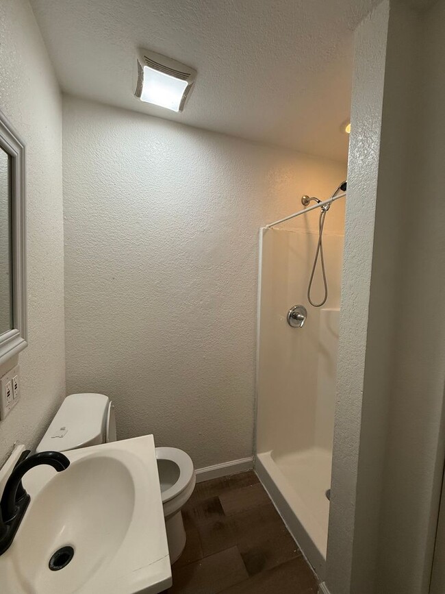 Photo - Updated 3BR w/ Hardwood Floors, Walk-In Shower & Stainless Steel Kitchen