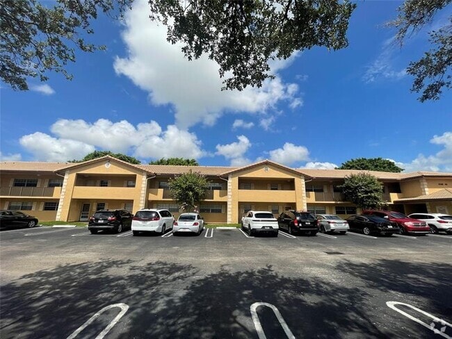 Building Photo - 3026 Coral Springs Dr Unit 106-3 Rental