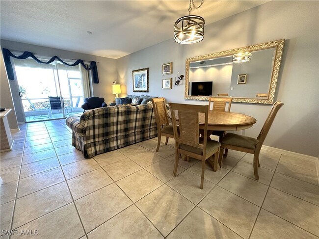 Building Photo - 6670 Huntington Lakes Cir Unit 103 Rental