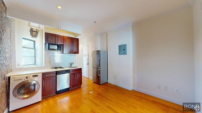 Building Photo - 610 E 9th St Unit 22 Rental