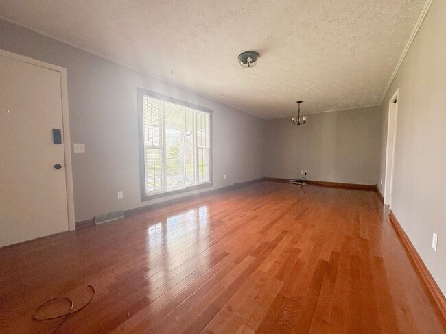 Photo - Spacious 3-Bedroom Home with Huge Yard, Covered Porches & Storage Building