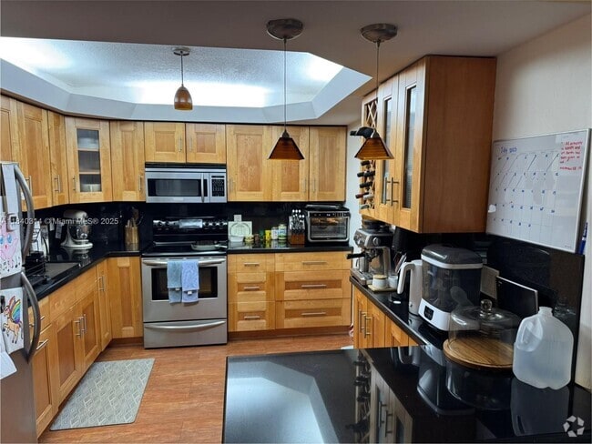 Building Photo - 7711 SW 56th St Unit 103A Rental
