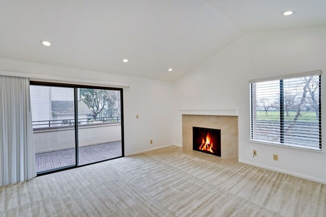 Building Photo - Spacious condo available in desirable Newpark Village community!