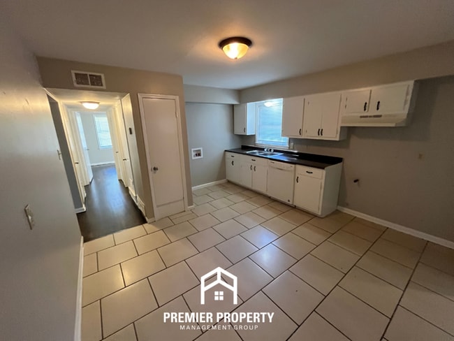 Photo - Spacious 4BR/2BA Home in Whitehaven | Hardwood Floors & 2-Car Garage