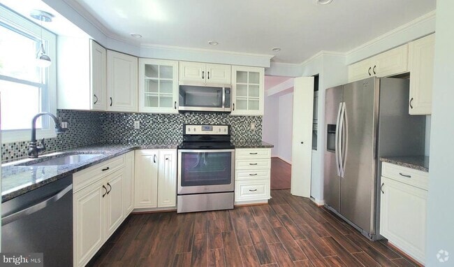 Building Photo - 7810 Muncaster Mill Rd Rental