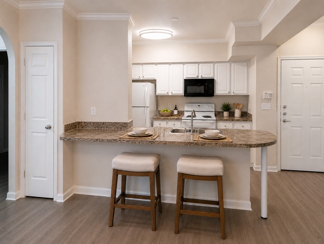 Photo - Spacious 2x2 vinyl plank flooring throughout, balcony & updated appliances
