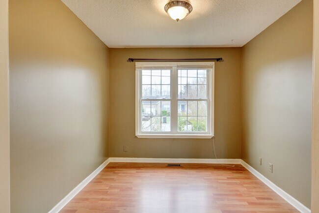 Photo - Amazing Home With Fireplace and Hardwood Flooring in Whitehall Subdivision