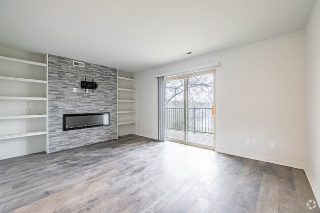 2BR, 1BA - 970SF - Living Room - The Pines Apartments and Townhomes