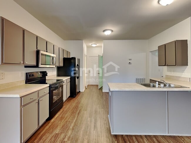 Photo - 704 Marjam Ln