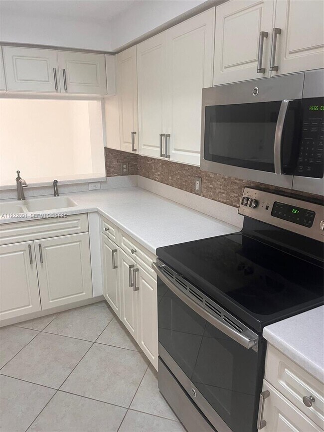 Photo - 3021 Alcazar Pl Unit 203