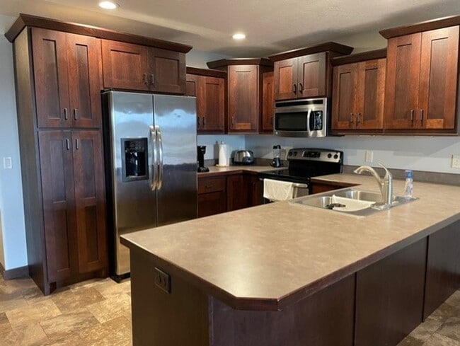 Building Photo - Spacious 2 Bedroom Grand Arbor Twin Home with Multiple Outdoor Spaces