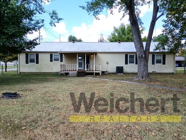 Photo - Updated 4-Bed Home with Fenced Yard & Carport
