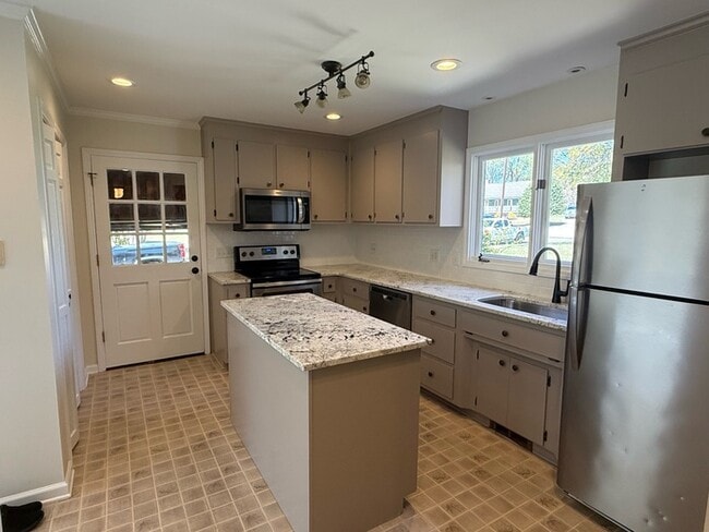 Photo - Spacious ranch, fenced yard, 2 car garage, large basement, near Wake Tech