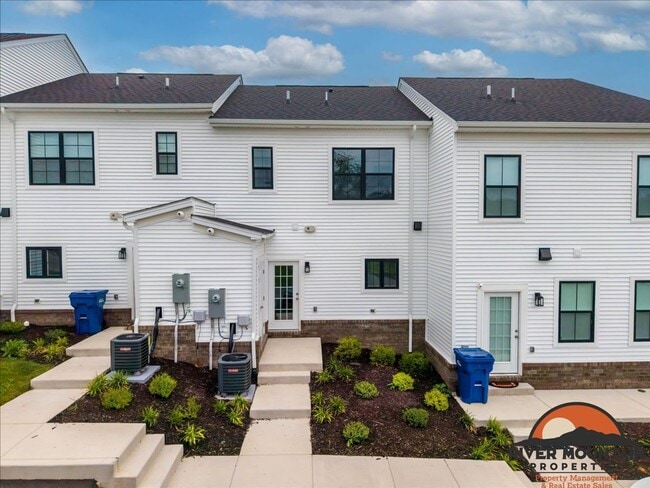 Photo - Well-Located Townhome with Private Off-Street Parking