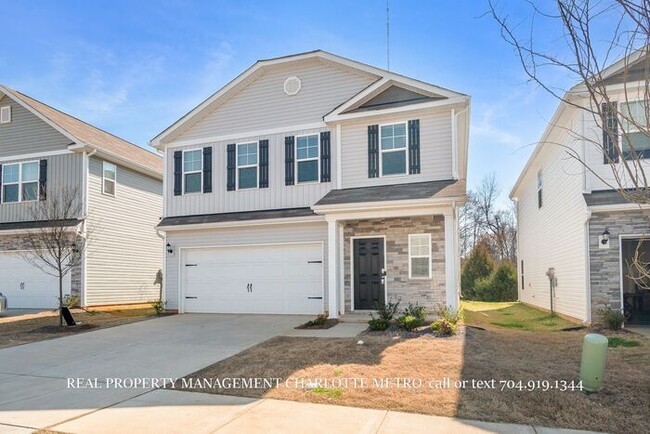 Photo - Stunning 4-bedroom, 2.5-bathroom home located in the vibrant city of Charlotte, NC.