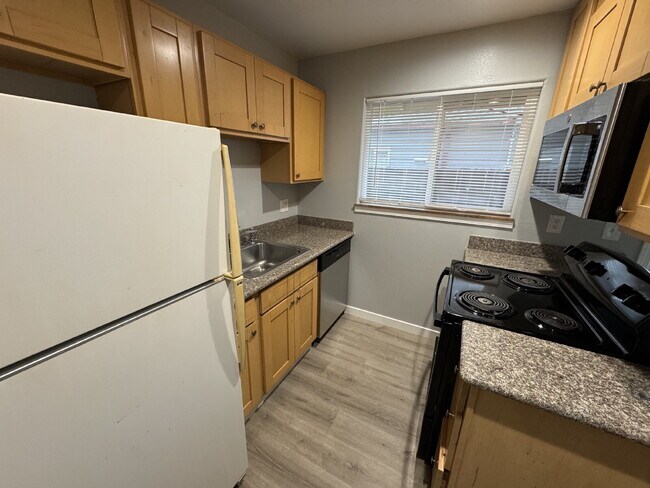 Photo - This 2 bed, 1 bath duplex unit offers convenient access to Berrydale and Harrison Parks and withi...